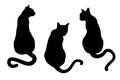 Vector illustration of three black silhouettes of cats isolated